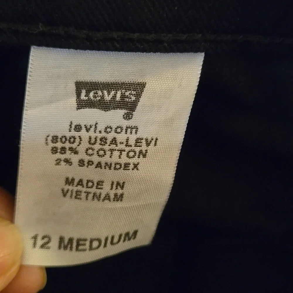 Levi's 550 relaxed boot cut Black jeans classic 5 pocket stretch 12 M Excellent…